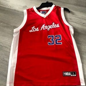 Another red basketball jersey.